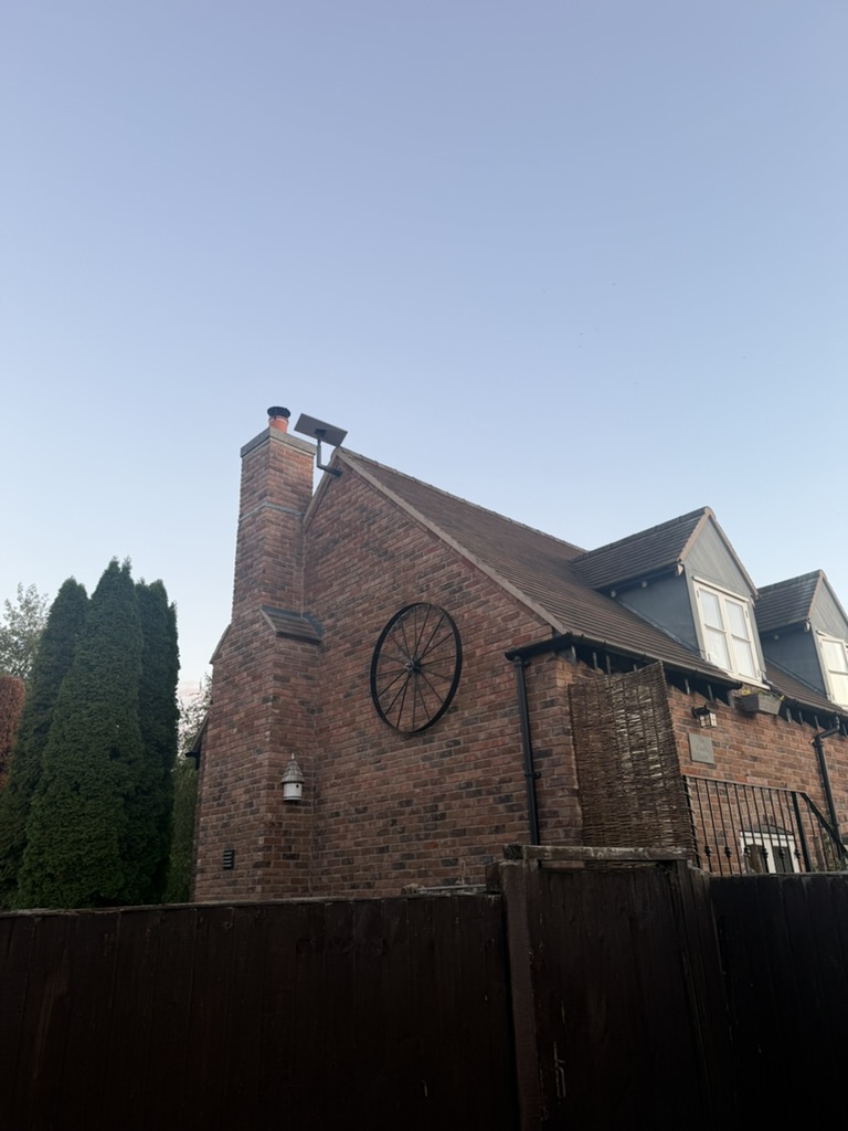 Completed discreet Starlink installation on the red brick home in Lower Moor